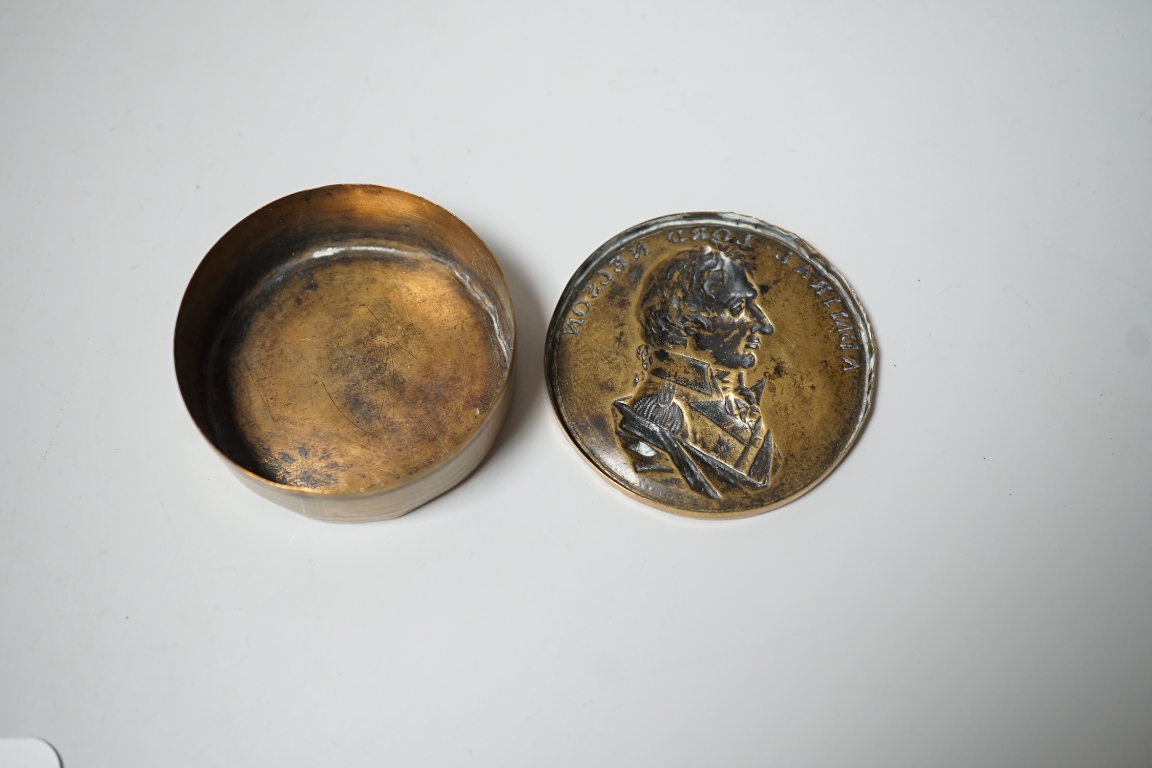 A 19th century brass Nelson snuff box